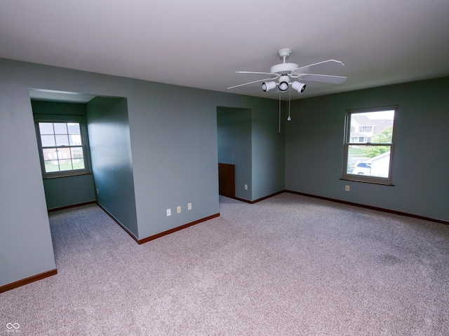4443 W Windsong Ct, New Palestine, IN 46163 - carpeted spare room with a ceiling fan and baseboards