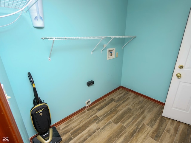 4443 W Windsong Ct, New Palestine, IN 46163 - washroom featuring washer hookup and wood finished floors