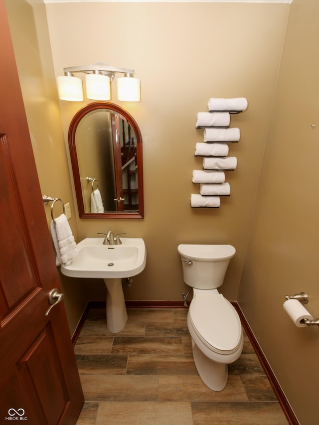 4443 W Windsong Ct, New Palestine, IN 46163 - half bath with toilet and wood finished floors