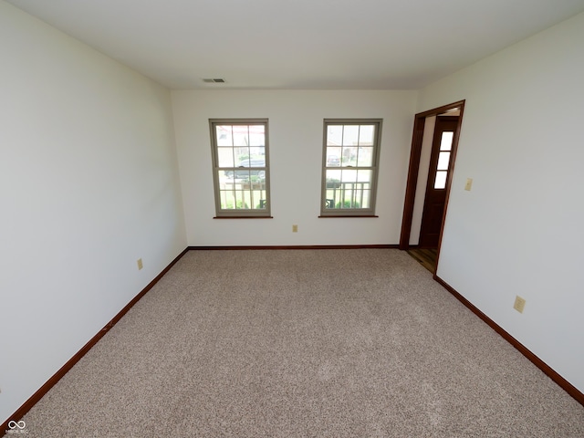 4443 W Windsong Ct, New Palestine, IN 46163 - empty room featuring light carpet and baseboards