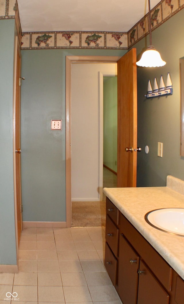 9808 E Troy Ave, Indianapolis, IN 46239 - bathroom featuring vanity and tile patterned flooring