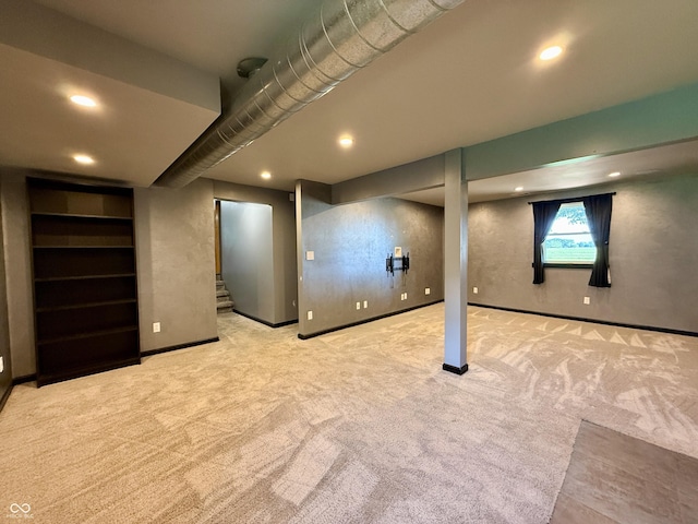9808 E Troy Ave, Indianapolis, IN 46239 - basement with carpet flooring, stairs, and recessed lighting