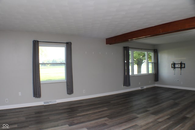 9808 E Troy Ave, Indianapolis, IN 46239 - unfurnished room with dark wood-type flooring and beam ceiling
