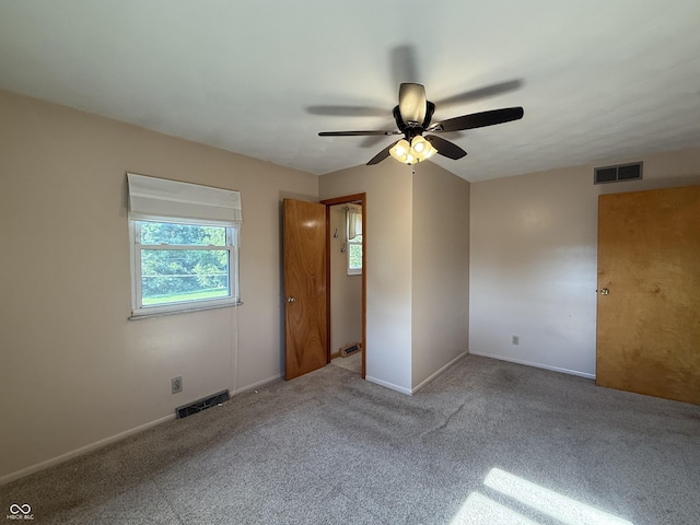 9808 E Troy Ave, Indianapolis, IN 46239 - unfurnished room featuring carpet floors and ceiling fan
