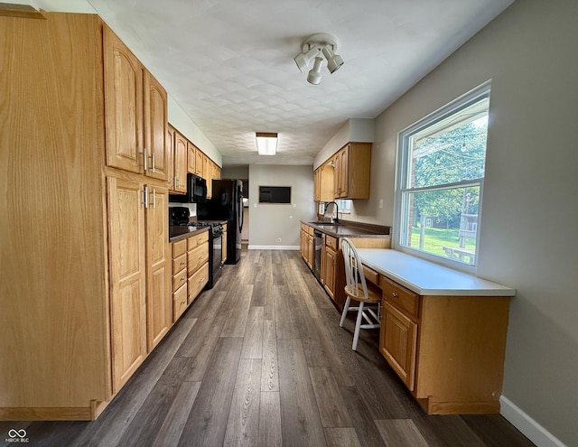 9808 E Troy Ave, Indianapolis, IN 46239 - kitchen featuring black appliances, dark wood-type flooring, and an office area