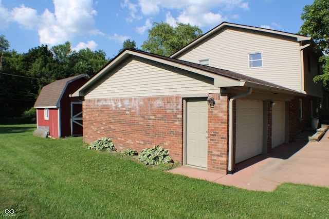 9808 E Troy Ave, Indianapolis, IN 46239 - view of property exterior with brick siding, a lawn, concrete driveway, and a storage shed