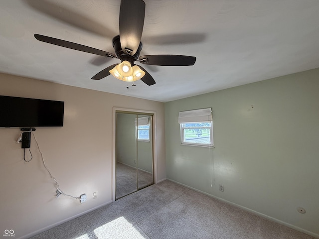 9808 E Troy Ave, Indianapolis, IN 46239 - unfurnished bedroom with carpet floors, ceiling fan, and a closet