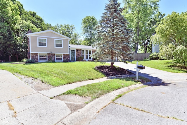 524 Concord Ct, Fishers, IN 46038 - tri-level home with brick siding and a chimney