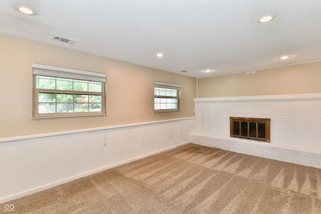 524 Concord Ct, Fishers, IN 46038 - basement with carpet floors, a textured ceiling, recessed lighting, and a fireplace