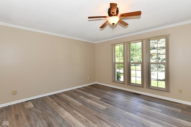 524 Concord Ct, Fishers, IN 46038 - spare room featuring dark wood-type flooring, a ceiling fan, and crown molding