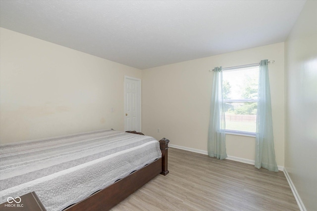 3624 Newberry Rd, Plainfield, IN 46168 - bedroom with light wood-style flooring