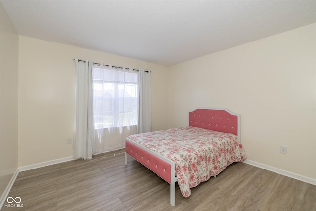 3624 Newberry Rd, Plainfield, IN 46168 - bedroom with wood finished floors and baseboards