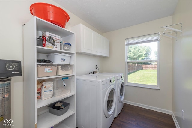 3624 Newberry Rd, Plainfield, IN 46168 - washroom featuring washer and dryer, cabinet space, and dark wood-type flooring