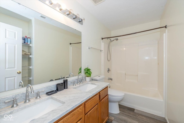 3624 Newberry Rd, Plainfield, IN 46168 - full bathroom featuring wood finished floors, tub / shower combination, and double vanity