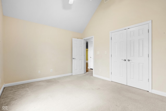 3244 Skyview Ct, Columbus, IN 47203 - unfurnished bedroom featuring carpet flooring, a closet, high vaulted ceiling, and ceiling fan