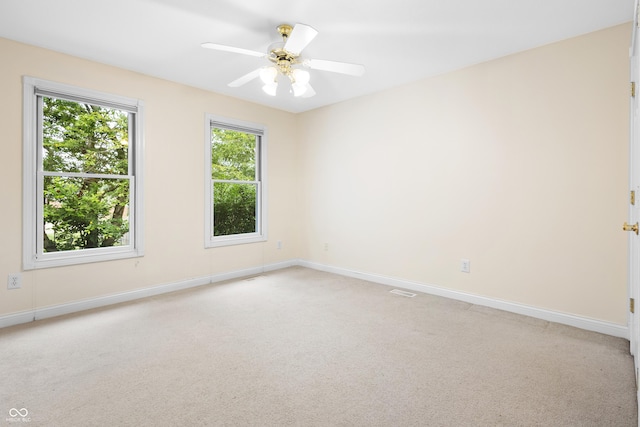 3244 Skyview Ct, Columbus, IN 47203 - spare room featuring light colored carpet and a ceiling fan