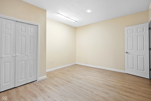 3244 Skyview Ct, Columbus, IN 47203 - unfurnished bedroom with light wood-type flooring and a closet