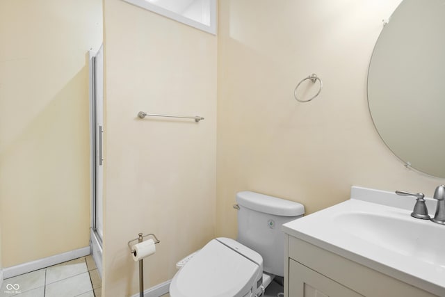 3244 Skyview Ct, Columbus, IN 47203 - bathroom featuring vanity, a shower with door, and tile patterned flooring