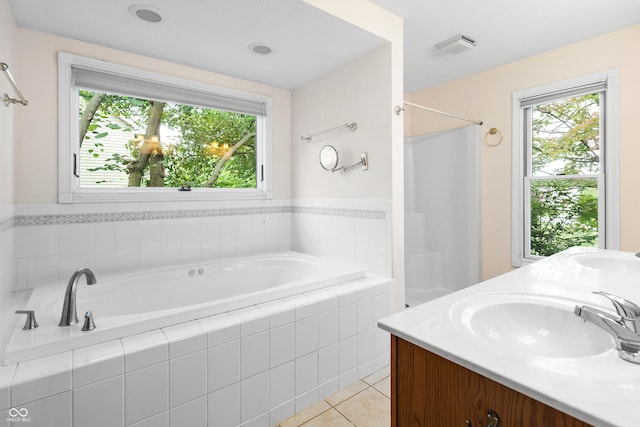 3244 Skyview Ct, Columbus, IN 47203 - bathroom featuring a bath, tile patterned flooring, double vanity, and a shower