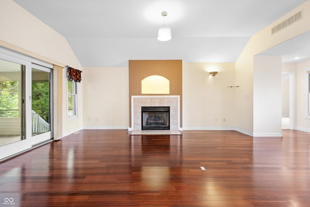 3244 Skyview Ct, Columbus, IN 47203 - unfurnished living room featuring lofted ceiling, hardwood / wood-style flooring, and a fireplace