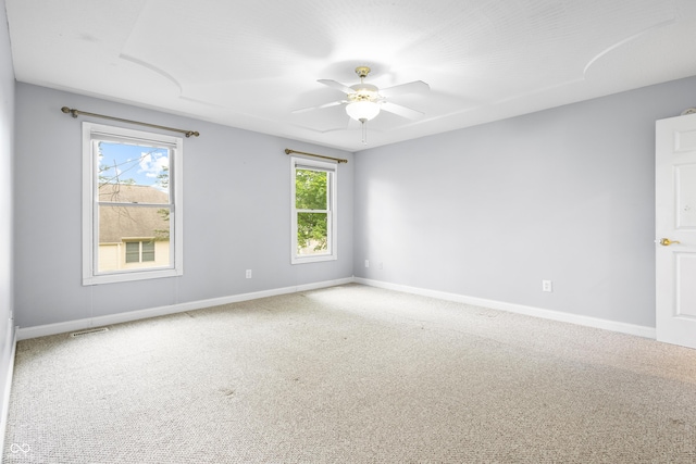 3244 Skyview Ct, Columbus, IN 47203 - spare room featuring carpet floors and ceiling fan
