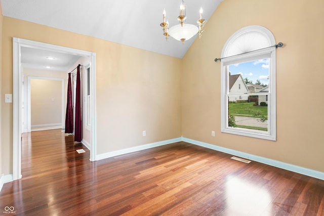 3244 Skyview Ct, Columbus, IN 47203 - unfurnished room featuring wood finished floors and vaulted ceiling