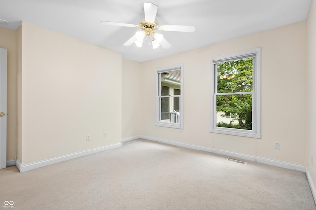3244 Skyview Ct, Columbus, IN 47203 - unfurnished room featuring light colored carpet and ceiling fan