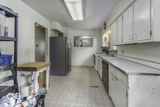 462 Woodview Dr, Noblesville, IN 46060 - kitchen with freestanding refrigerator, light flooring, light countertops, white cabinetry, and dishwasher