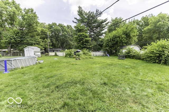 462 Woodview Dr, Noblesville, IN 46060 - view of yard featuring an outdoor pool and a shed