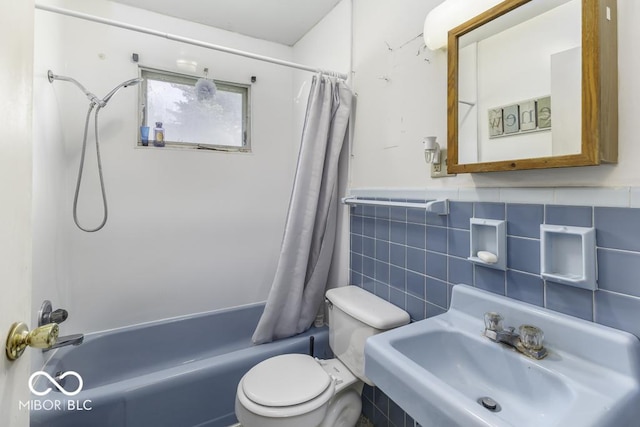 462 Woodview Dr, Noblesville, IN 46060 - bathroom with shower / bath combination with curtain, tile walls, and a wainscoted wall