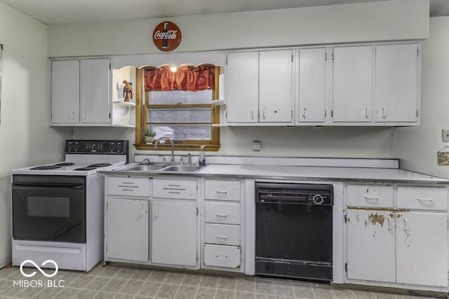462 Woodview Dr, Noblesville, IN 46060 - kitchen with black dishwasher, range with electric cooktop, light countertops, and white cabinetry