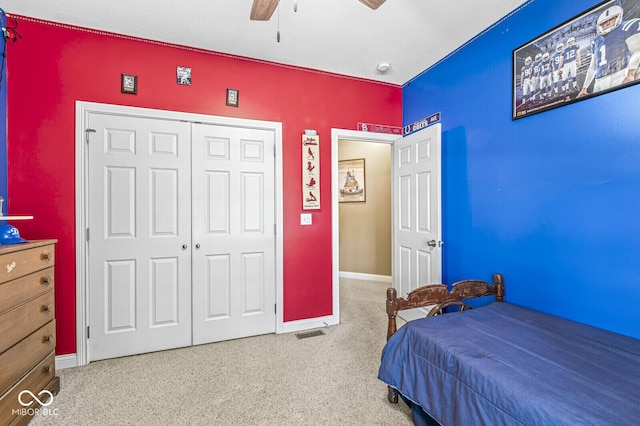11 Stratford Way, Danville, IN 46122 - bedroom featuring carpet floors, a closet, and a ceiling fan