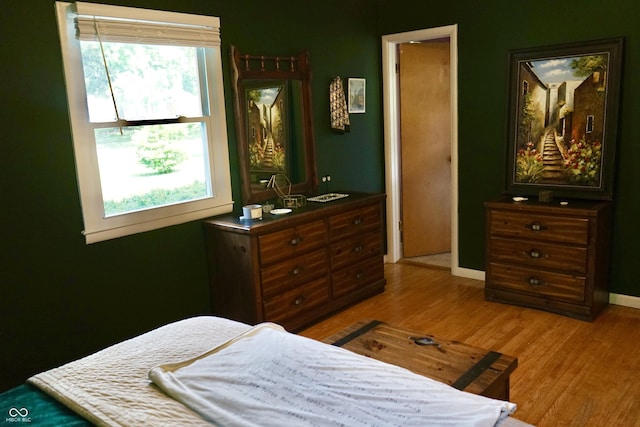 7780 Cree Trl, Indianapolis, IN 46250 - bedroom featuring light wood-style floors and baseboards