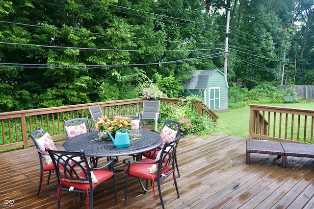 7780 Cree Trl, Indianapolis, IN 46250 - wooden terrace featuring outdoor dining space and a shed