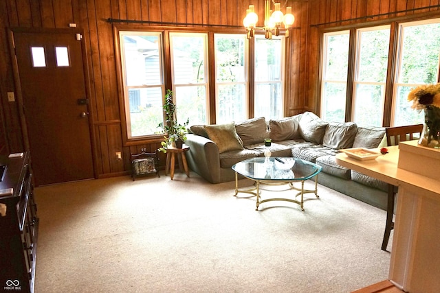 7780 Cree Trl, Indianapolis, IN 46250 - carpeted living room with wood walls and a chandelier