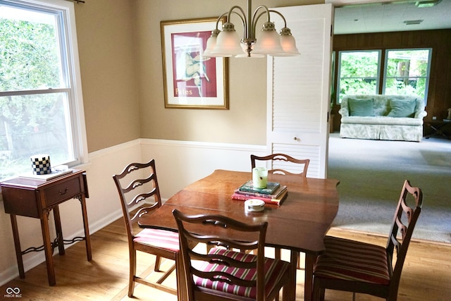 7780 Cree Trl, Indianapolis, IN 46250 - dining space with plenty of natural light and wood finished floors