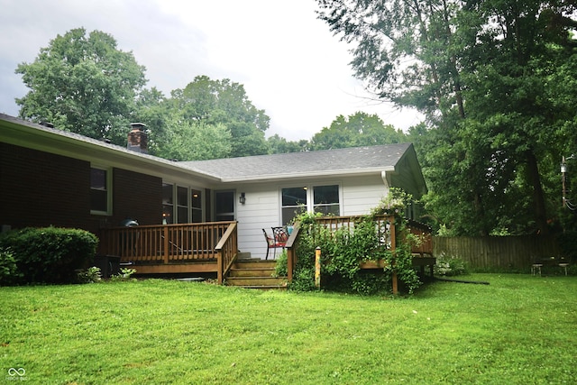 7780 Cree Trl, Indianapolis, IN 46250 - rear view of property with a deck and a chimney