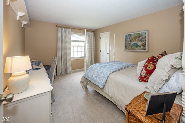 12602 Lockerbie Cir, Carmel, IN 46033 - bedroom with light carpet and baseboards