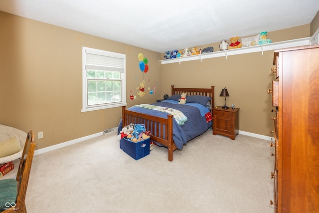 12602 Lockerbie Cir, Carmel, IN 46033 - bedroom with light carpet and baseboards