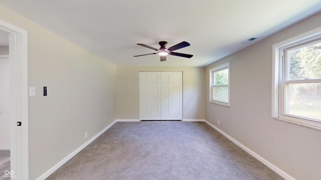 830 Stardust Blvd, Noblesville, IN 46060 - unfurnished bedroom with a closet, ceiling fan, and carpet floors