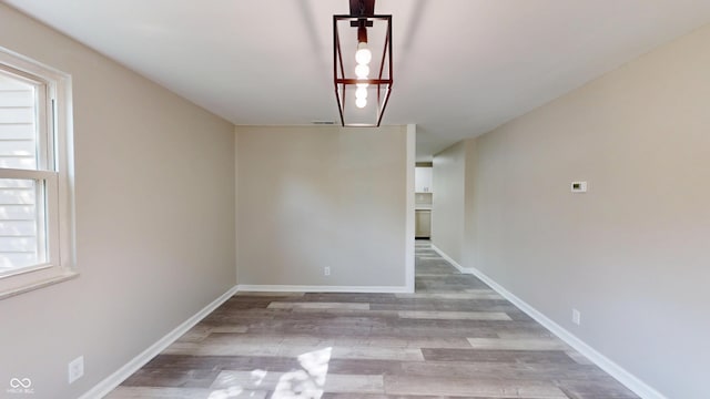 830 Stardust Blvd, Noblesville, IN 46060 - unfurnished room featuring wood finished floors and baseboards