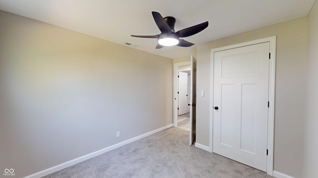 830 Stardust Blvd, Noblesville, IN 46060 - unfurnished bedroom with light carpet and ceiling fan
