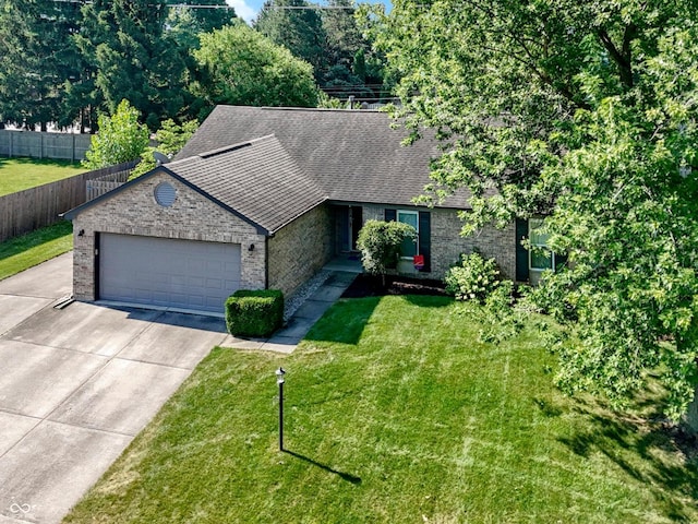 7683 Madden Dr, Fishers, IN 46038 - view of front of property with brick siding, a garage, concrete driveway, and roof with shingles