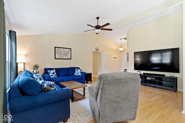 7683 Madden Dr, Fishers, IN 46038 - living area featuring lofted ceiling, a ceiling fan, and light wood finished floors