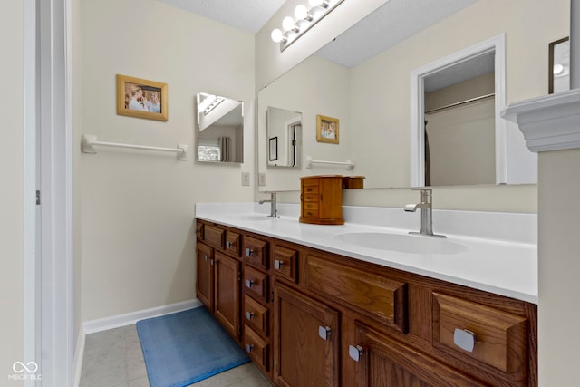 7683 Madden Dr, Fishers, IN 46038 - bathroom featuring double vanity and tile patterned flooring