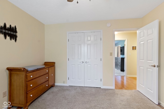 7683 Madden Dr, Fishers, IN 46038 - bedroom featuring light colored carpet, a closet, and ceiling fan