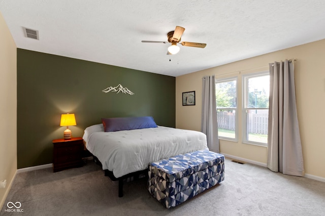 7683 Madden Dr, Fishers, IN 46038 - carpeted bedroom with baseboards and ceiling fan