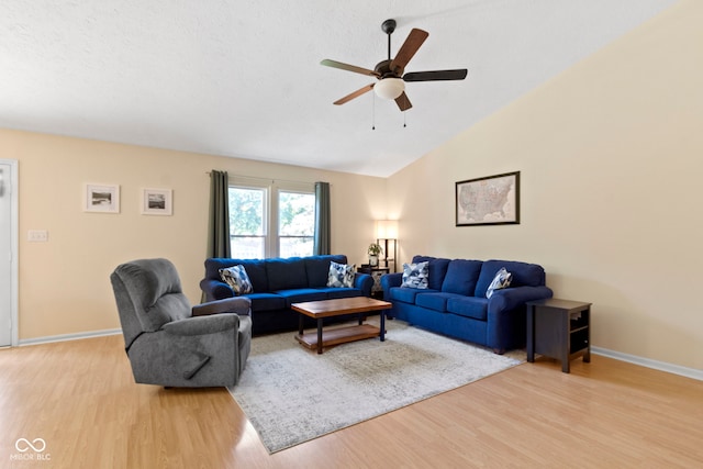 7683 Madden Dr, Fishers, IN 46038 - living area featuring wood finished floors, ceiling fan, and lofted ceiling
