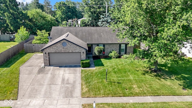 7683 Madden Dr, Fishers, IN 46038 - view of front of home featuring brick siding, a garage, roof with shingles, and concrete driveway