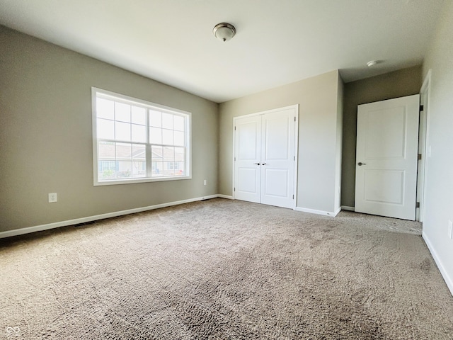 10 Doe Creek Cir, Cloverdale, IN 46120 - unfurnished bedroom with carpet floors and a closet
